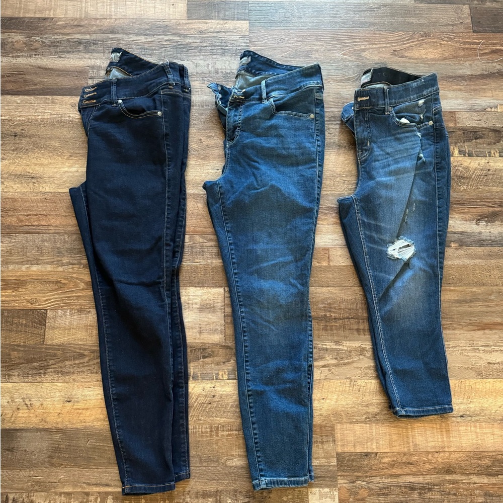 3 pairs of Torrid premium size 14 women’s jeans- 2 jeggings and 1 capri